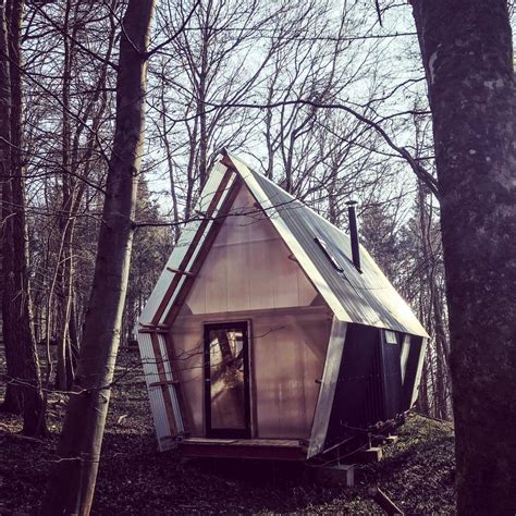 Invisible Studio built this mobile micro home at its woodland studio ...