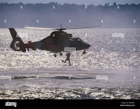 Rescue swimmer helicopter hi-res stock photography and images - Alamy