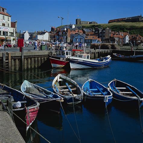 Whitby on the Yorkshire coast, a stunning sight with atmospheric Abbey ruins looking out to sea ...