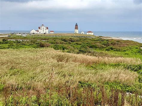 Point Judith Lighthouse I Photograph by Susan McVicar - Pixels