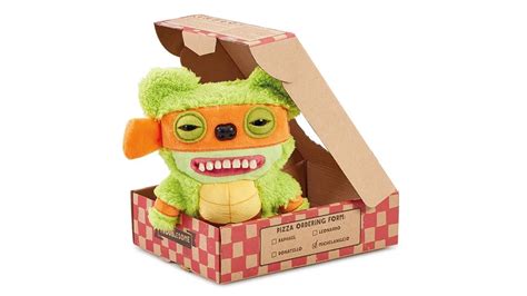 TEENAGE MUTANT NINJA TURTLES X FUGGLER MICHELANGELO - The Toy Insider