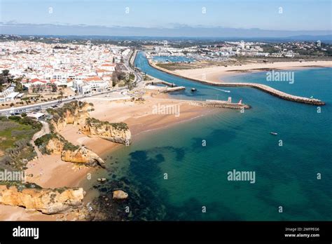 Aerial view of golden coast cliffs of portuguese southern beaches in ...