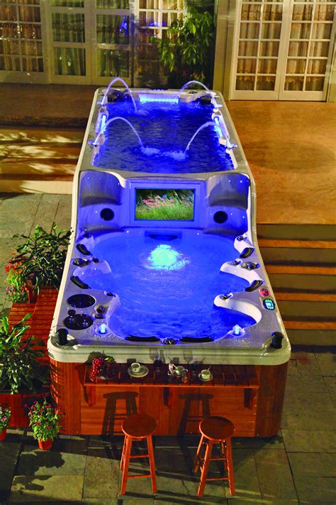 This Ultimate Hot Tub Has Two Tiers With an Attached Endless Swimming Pool