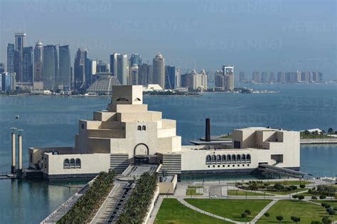 Doha Museum of Islamic Art in harbor, Doha, Qatar stock photo