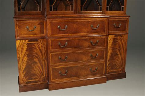 Baker Furniture company Colonial Revival styled breakfront/secretary in mahogany.