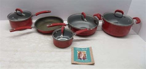 Nine-Piece set of Pioneer woman pots, fry pans, and lids, up to 10"Dia ...