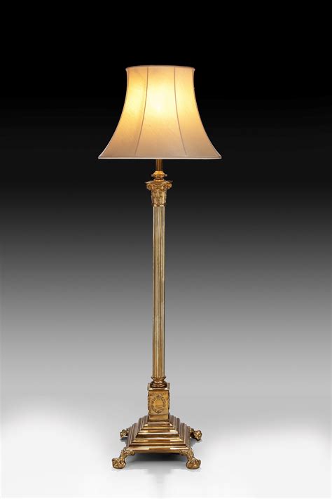 ANTIQUE BRASS ADJUSTABLE STANDARD LAMP WITH REEDED COLUMN