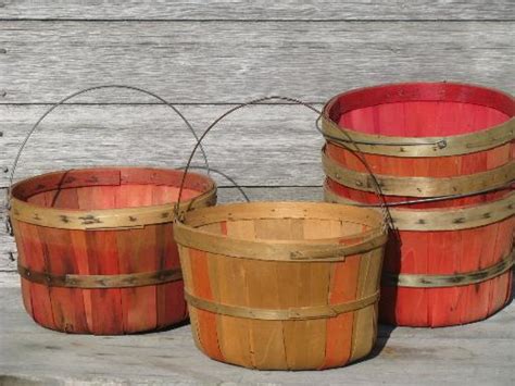 lot old farmer's market wood baskets for orchard or farm garden produce