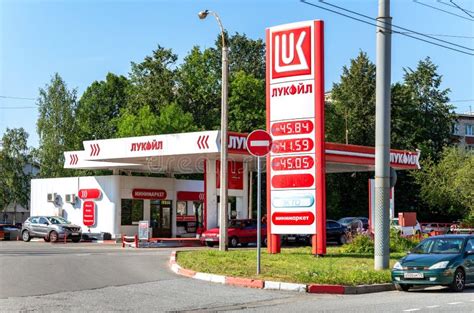 Lukoil Gas Station with Fueling Cars Editorial Stock Photo - Image of gasoline, pump: 129543033