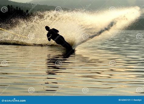 Water skier silhouette stock image. Image of silhouette - 6265131