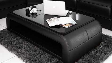 Description Use this leather coffee table to add style and practical functionality to any formal ...