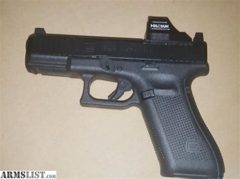 ARMSLIST - For Sale: Glock 19mos gen5 with glock 45 lower with holosun 507c