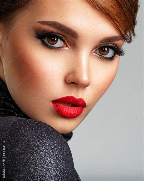 Beautiful girl with red lips and short hair. Pretty face of an young ...