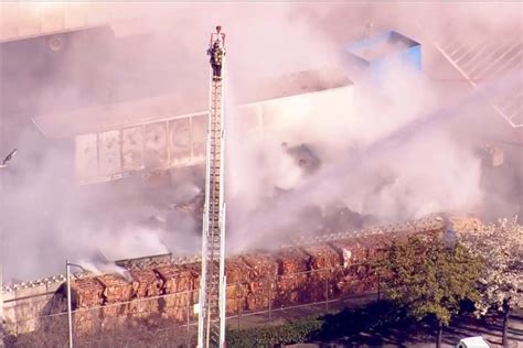 Tesla factory fire in Fremont, California - Firefighters battle massive ...