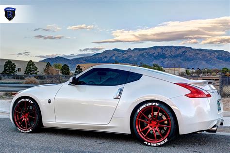 Rohana RF2 Candy Red Rims on a White Nissan 370Z | Nissan 370z, White ...