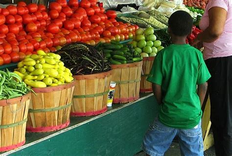 Mississippi Farmers Market - Natalie Maynor | A young boy lo… | Flickr