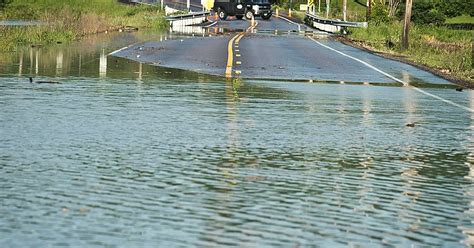 Floods cause water main damage, road closures