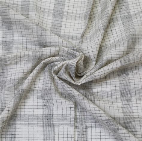 Handloom Cotton Fabric In uneven stripes & checks • Vritti Designs