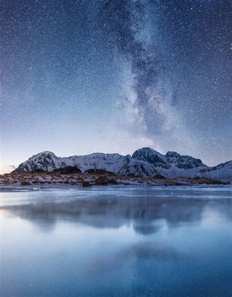 Night Sky and Reflection on the Frozen Lake. Stock Image - Image of ...