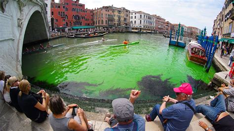 Venice's Grand Canal turns neon green due to fluorescein, officials say