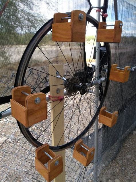 Bird Feeder Ferris Wheel Bird Feeders by David B. | Bird feeders, Diy bird feeder, Stain colors