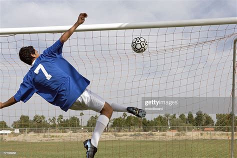 Soccer Player Scoring A Goal High-Res Stock Photo - Getty Images