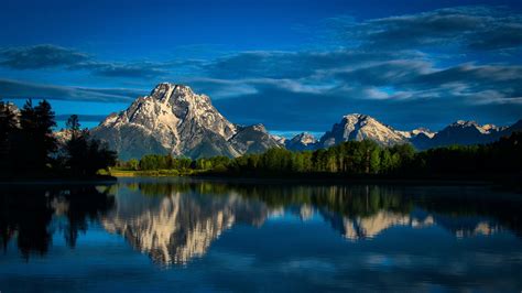 Beautiful Scenery Landscape View Of Rocks Mountains Green Trees Forest Reflection On Water Under ...