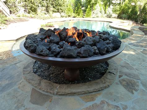 60" Barbados fire bowl with large black lava rock. Available in electronic or manual ignition ...