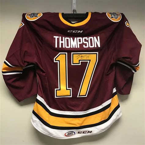 AHL Authentic - Chicago Wolves Captains Jersey Worn and Signed by #17 Paul Thompson