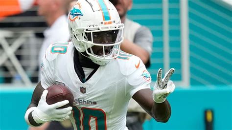 Dolphins wide receiver Tyreek Hill says the peace sign has been ...