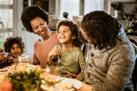 Black Family Christmas Dinner Stock Photos, Pictures & Royalty-Free Images - iStock