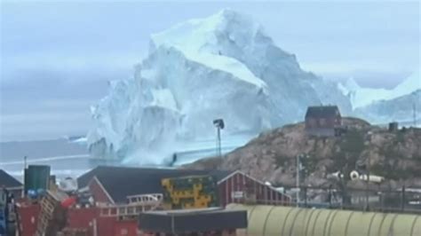 Huge iceberg threatens tiny Greenland village