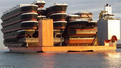 That's a load of ships! The carrier boat that can hold up to 22 barges ...