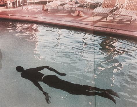 25 years ago: 76ers center manute bol takes a swim in a hotel pool ...