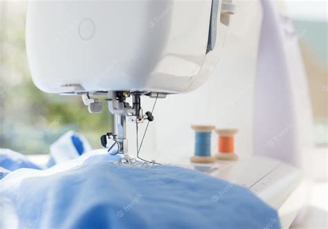 Premium Photo | Detail of sewing machine and sewing accessories