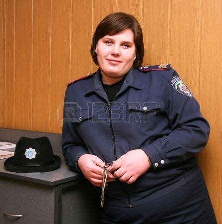 A Female Prison Warden In Uniform With The Keys In His Hand Royalty ...