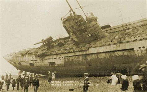 A WW1 submarine with a hull number of U-118 was found washed ashore on the beach at Hastings ...