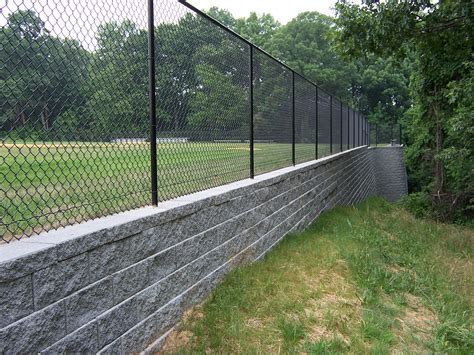 Fence Post in Retaining Wall | CornerStone Wall Solutions