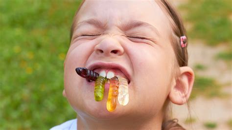 The Science Behind The Funny Faces We Make When Eating Sour Candy