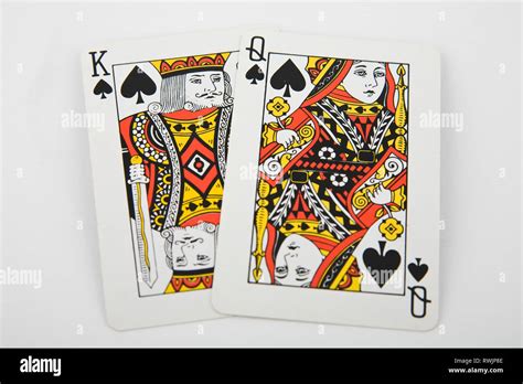 king and queen - playing cards on light background Stock Photo - Alamy