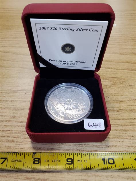 TWENTY DOLLAR STERLING SILVER COIN IN CASE