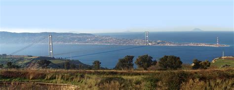 View on Strait of Messina, with the bridge. | Bay bridge, San francisco skyline, Skyline