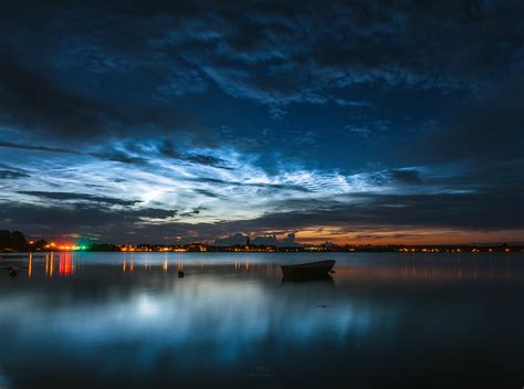 Shining Silver-Blue Clouds Captured in Night Sky Photo | Space