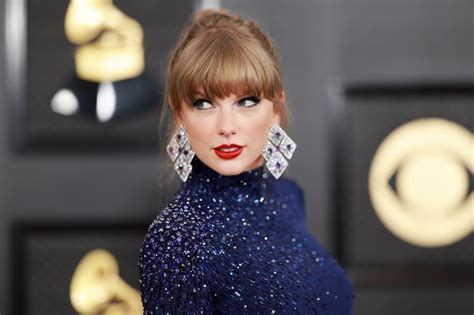 Taylor Swift Wore Navy Crop Top and Skirt on 2023 Grammys Red Carpet