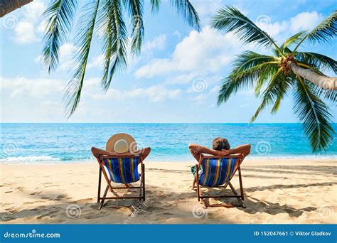 Couple Relax on the Beach Enjoy Beautiful Sea on the Tropical Island Stock Image - Image of ...