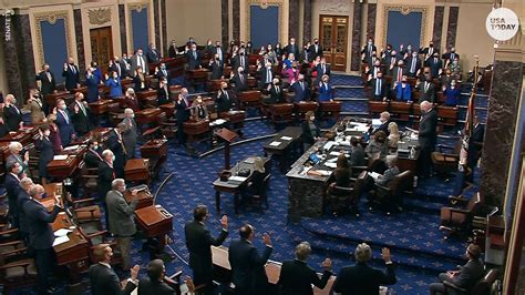 Trump impeachment trial continues with senators' swearing-in