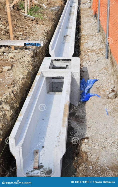 Street gutter construction stock photo. Image of concrete - 135171390