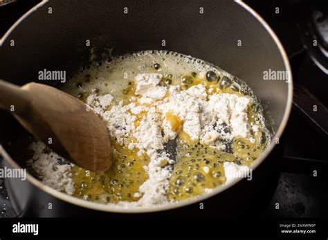 cooking sauce from butter and flour. Add flour to melted butter. Breading Stock Photo - Alamy