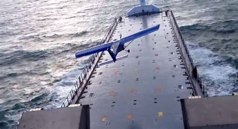 Small Plane Lands on Cargo Ship