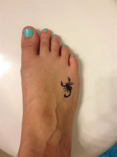 Picture Of tiny scorpion foot tattoo